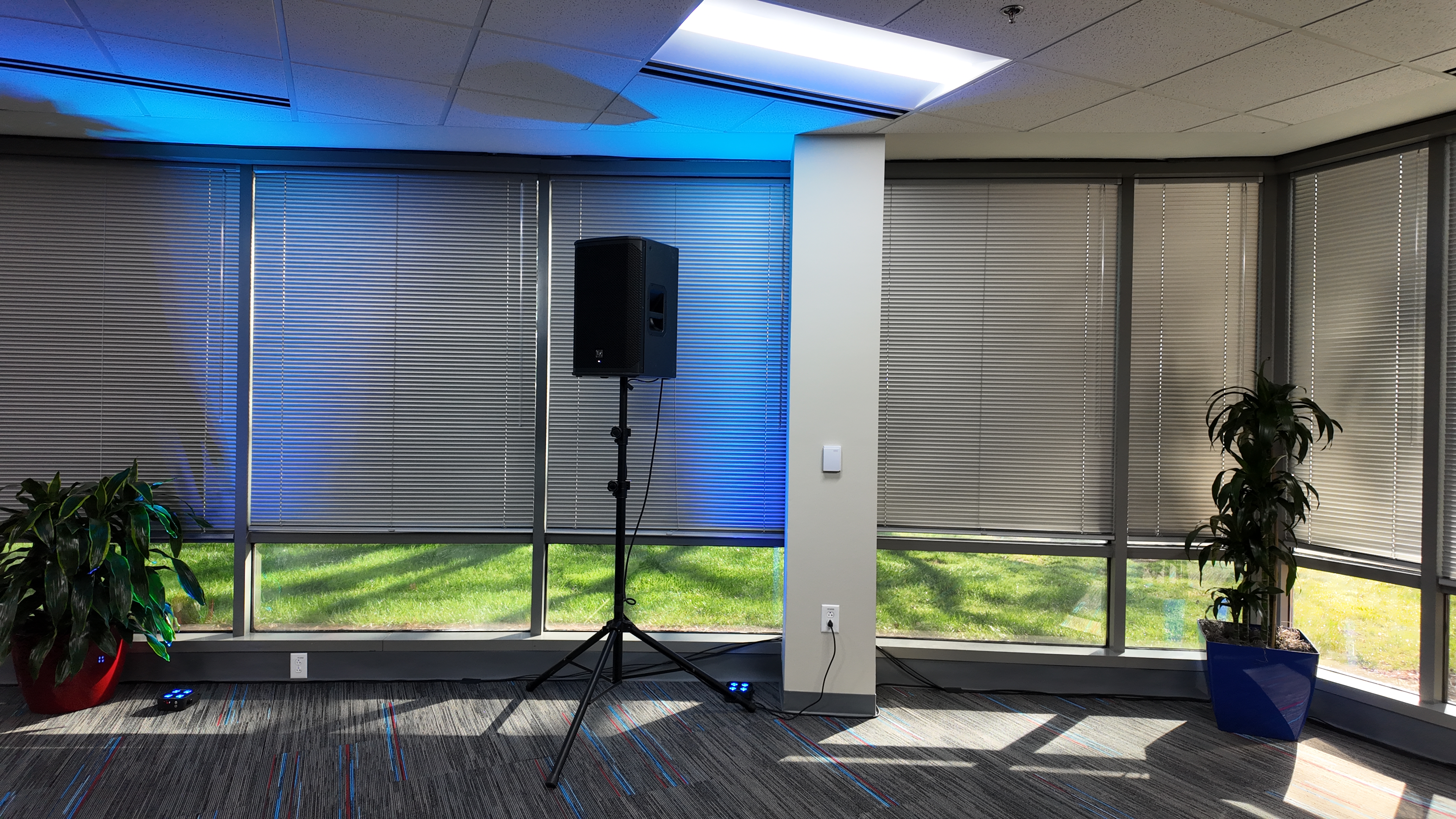 PA speaker with blue uplighting at PSA Airlines corporate event Charlotte NC
