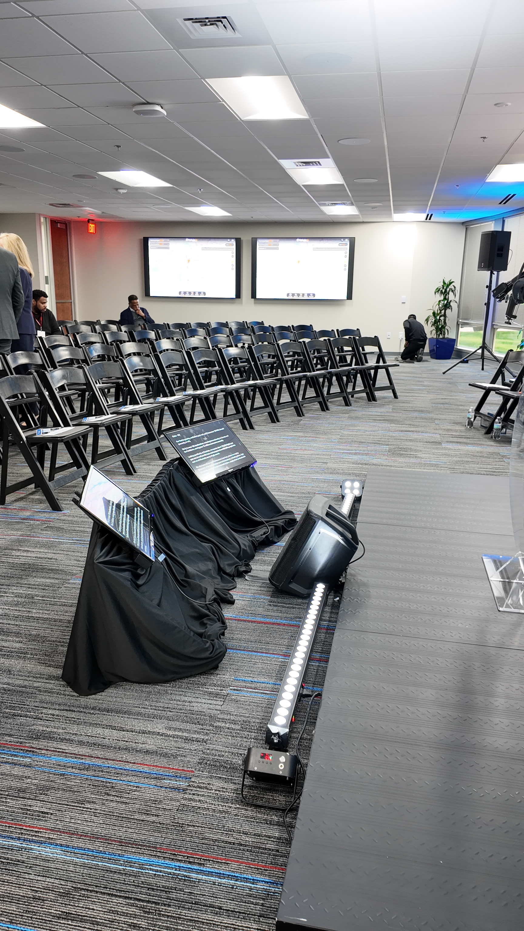 Modular stage setup with confidence monitors at PSA Airlines grand opening Charlotte NC